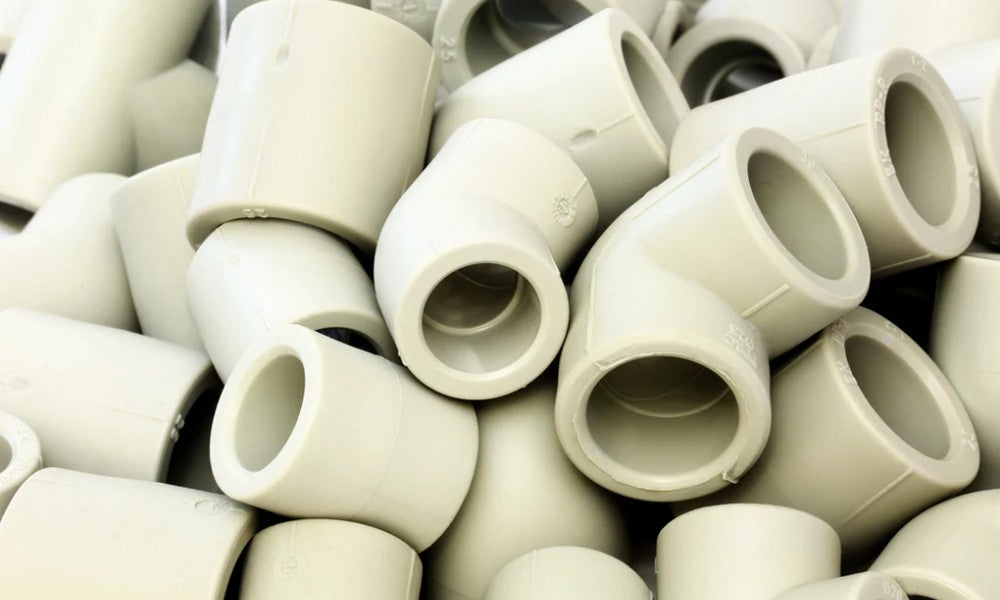A pile of PVC fittings.